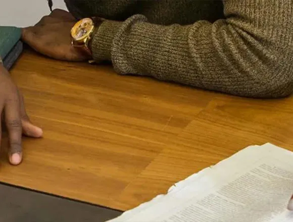 People looking at document